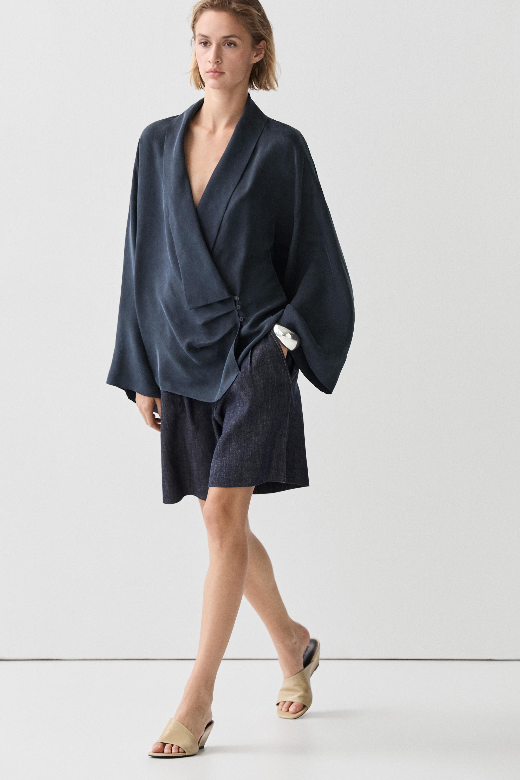 Flowing gathered wrap blouse
